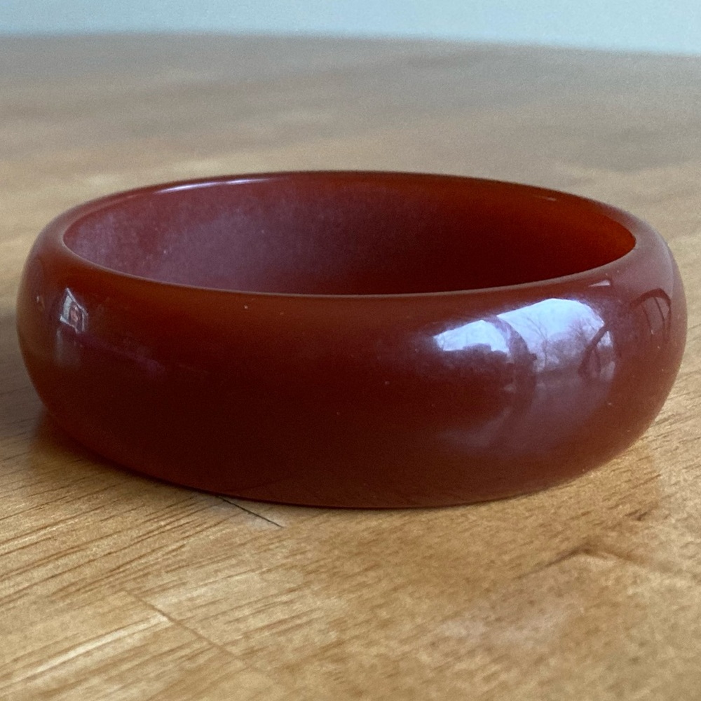 Burnt orange lucite bangle bracelet